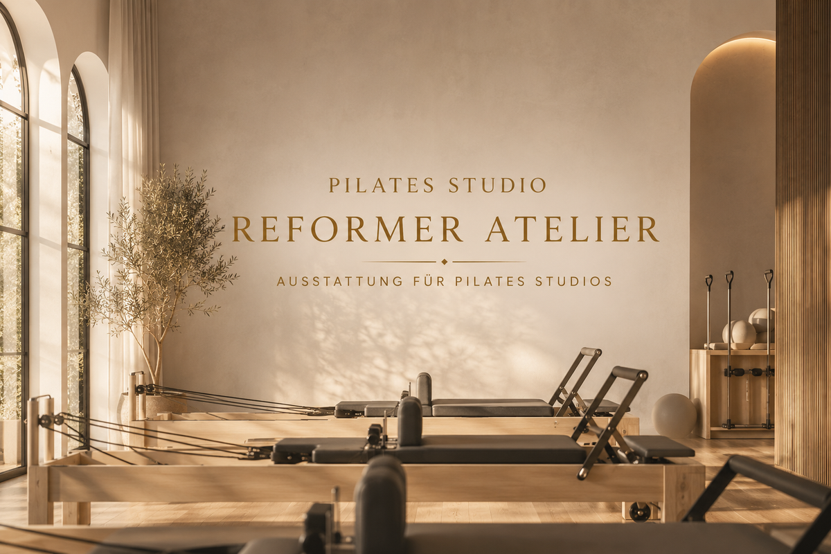 Pilates studio with several reformers and a cadillac by The Virtù Line — wooden models in a studio setting